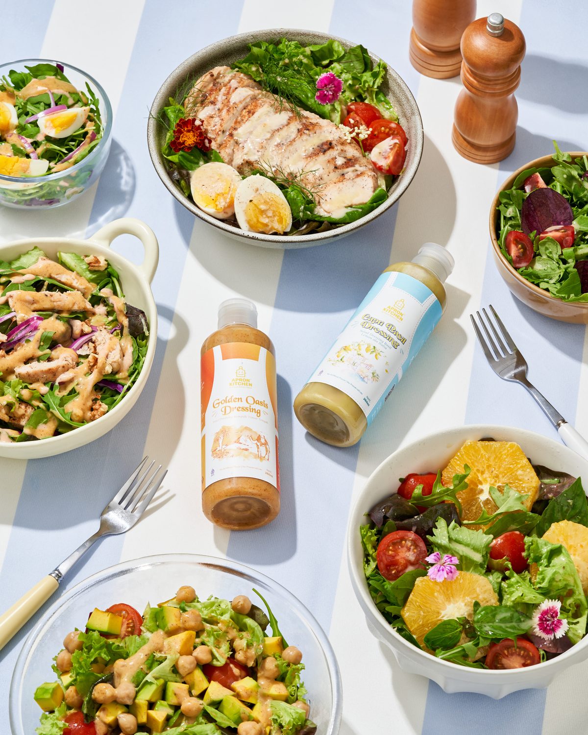 A spread of salads with Apron Kitchen dressings